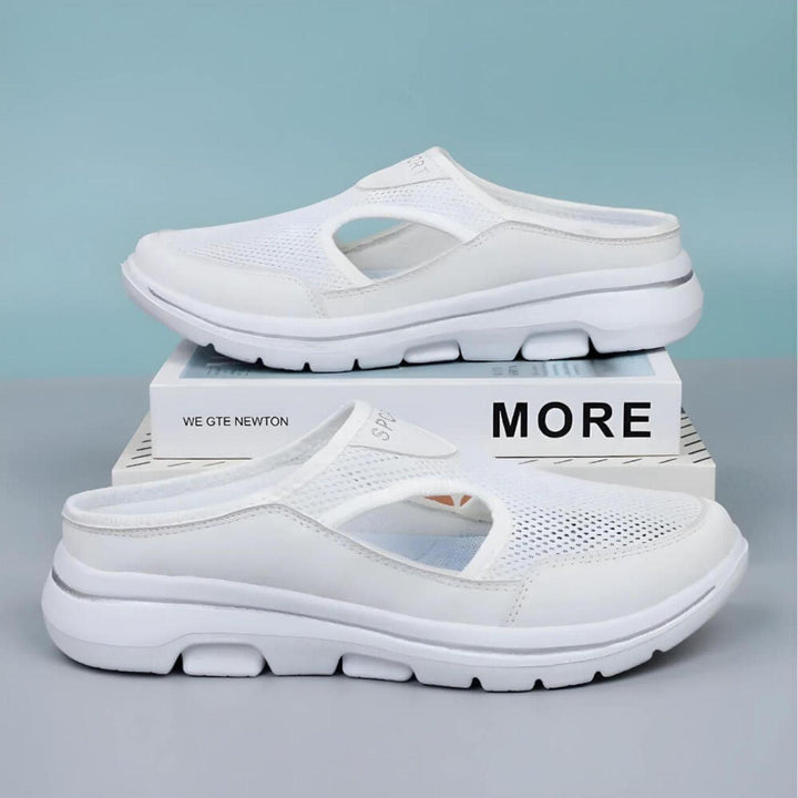 Women's casual slip-on sandals, ergonomic comfort and stylish cutouts for active summer days.