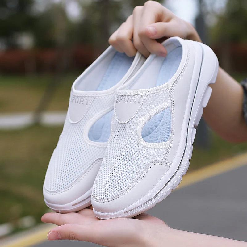 Versatile women's comfort slip-on sandals with chic cutouts, great for any summer outfit.