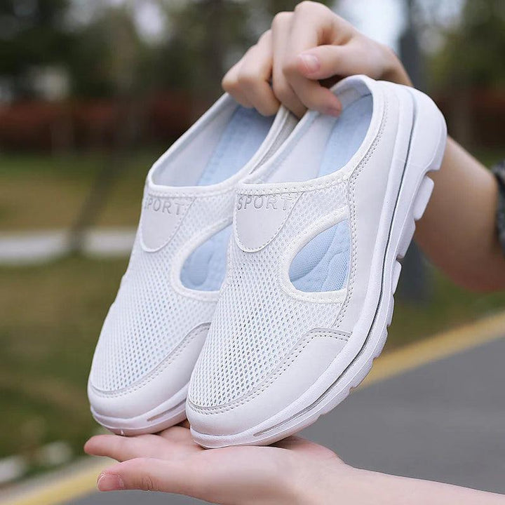 Versatile women's comfort slip-on sandals with chic cutouts, great for any summer outfit.