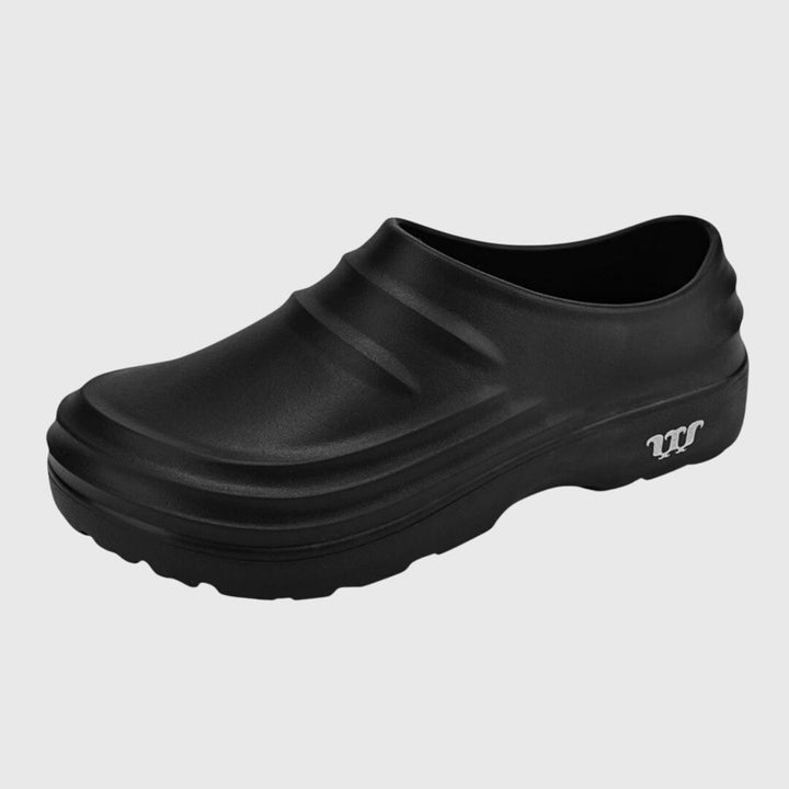 Cream women's slip-on sandals with arch support, ideal for comfortable summer walking & everyday use.