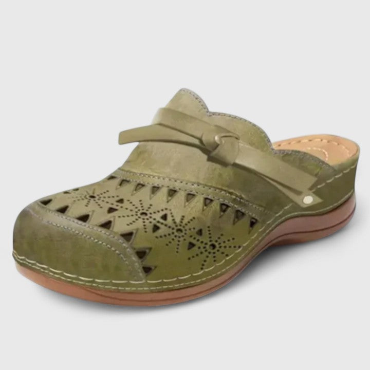 Orthotic women's sandals with superior arch support, ideal for comfortable walking & foot pain relief.