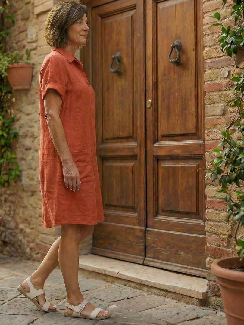 Women's short-sleeve button-front knee-length dress for casual comfort, great for summer courtyard walks.