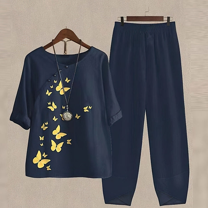 Chic women's matching shirt and trousers set, ideal for a stylish casual look or spring/summer holiday fashion.