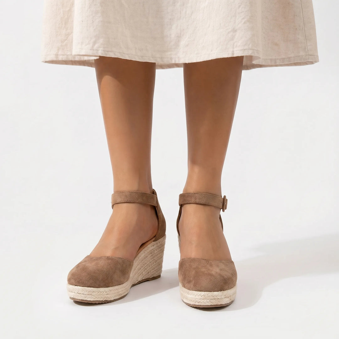 Comfort-focused women's closed toe wedge sandals with ankle strap. Ideal platform summer shoes for elegant daily wear.