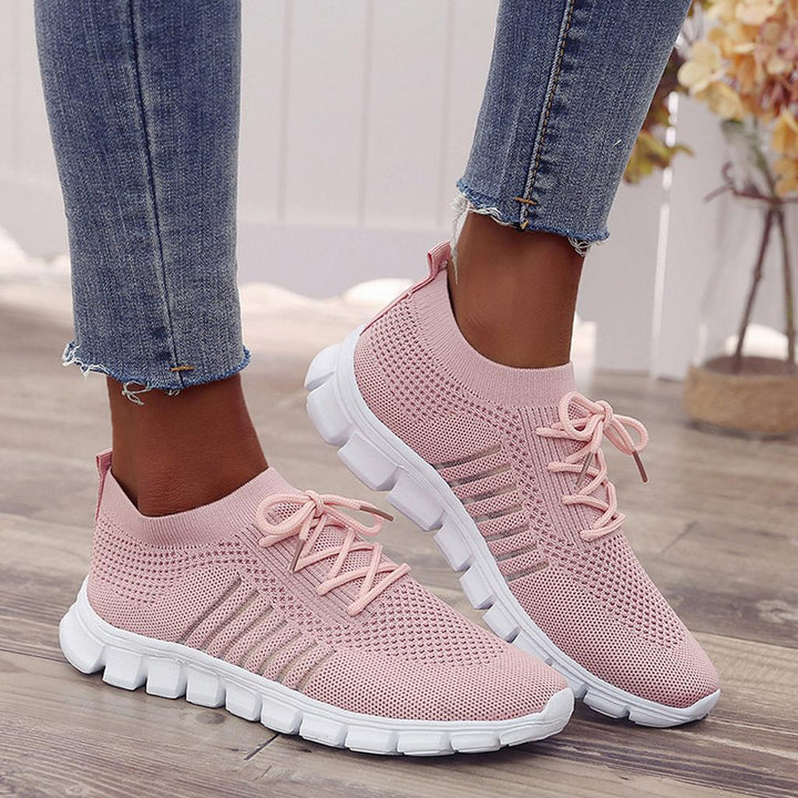 Women's comfortable everyday sneakers in white, ideal for casual wear.