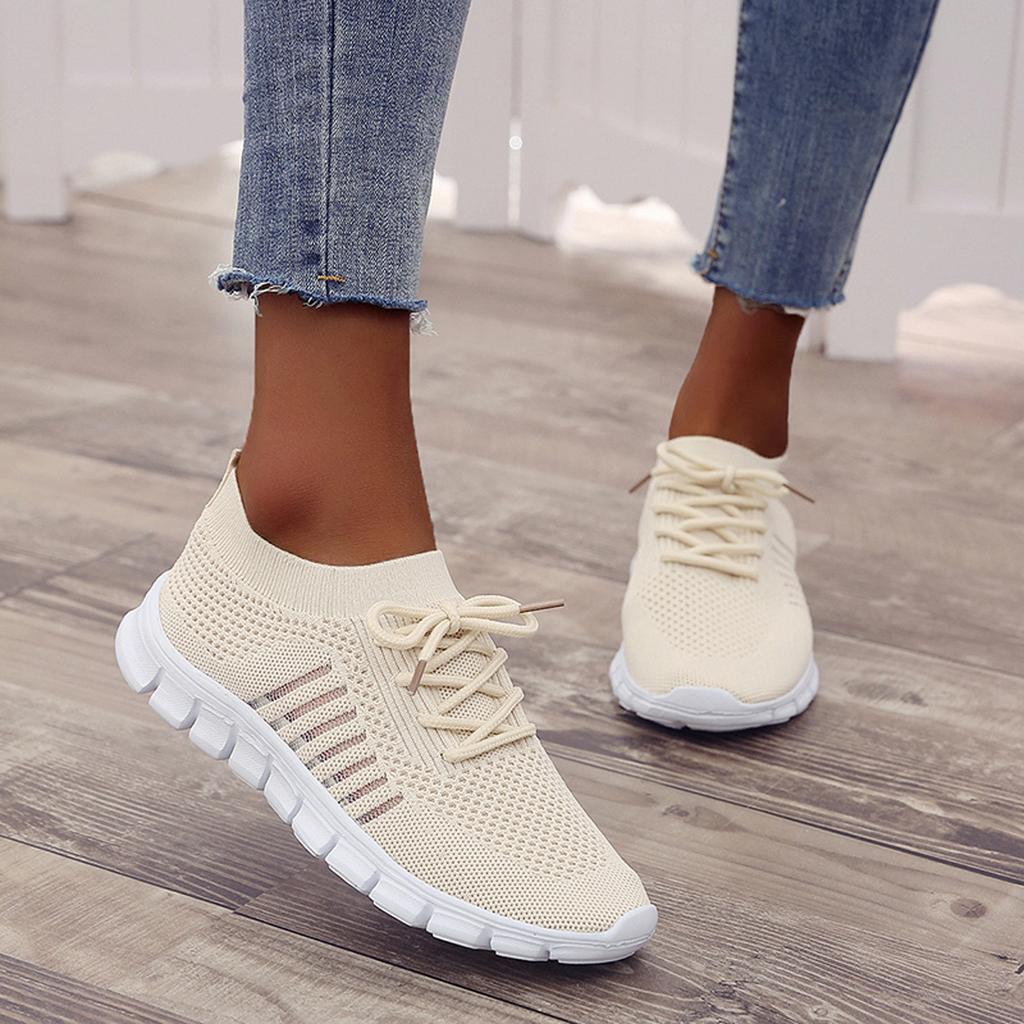 Stylish and lightweight women's fashion sneakers with breathable mesh upper.