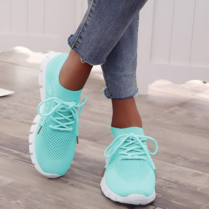 Durable and breathable women's orthopedic sneakers for all-day comfort.