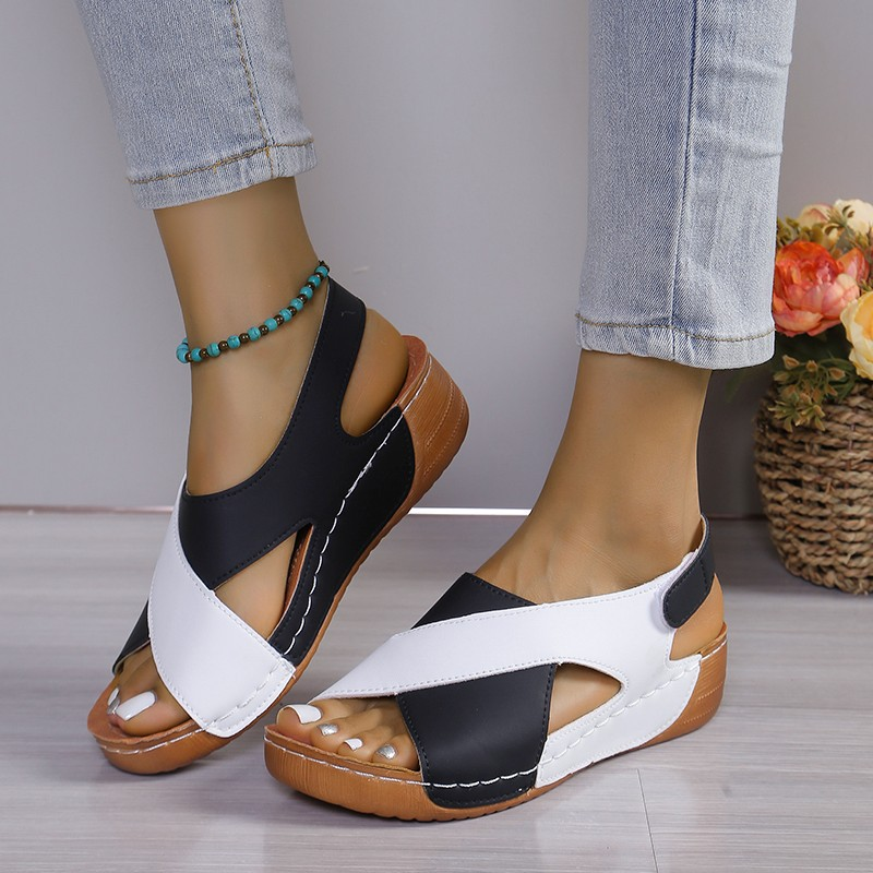 Black women's everyday wedge sandals, offering stylish comfort and support for versatile wear.
