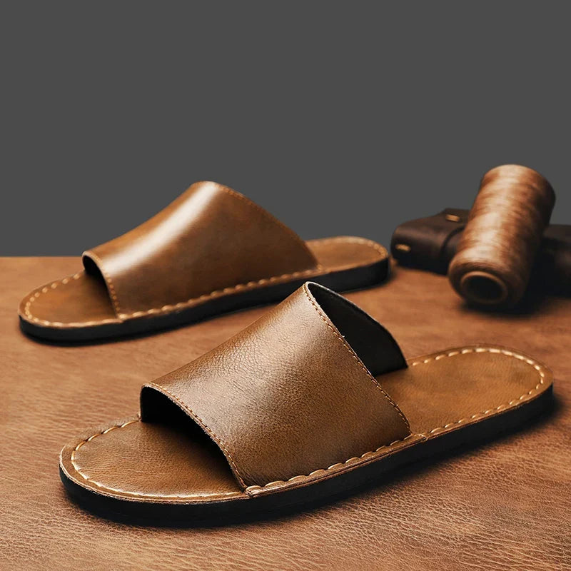 Chic slip-on flat sandals for women, featuring a stylish textured finish and comfortable open toe for summer.