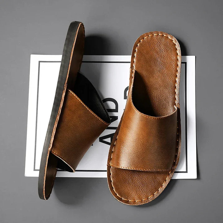 Casual brown flat sandals for women, designed with an open toe and textured straps for ultimate comfort & style.