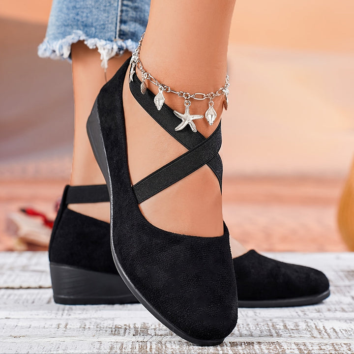 Royal blue comfortable flat wedge sandals for women, ideal for casual and dressy summer occasions.