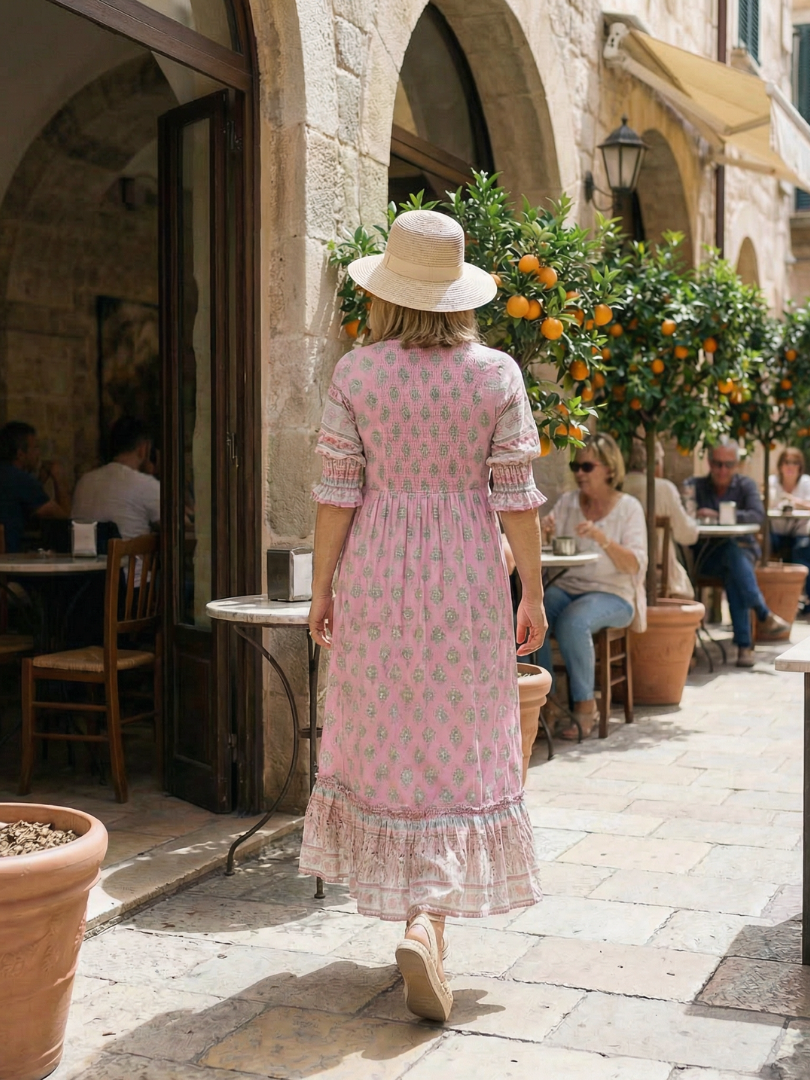 Vibrant floral print garden market dress for women. Casual, knee-length, 3/4 sleeve, perfect for everyday comfort.