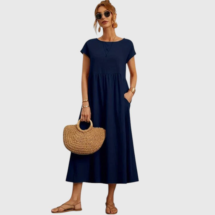 Women's comfortable flowy midi dress for summer style. Everyday casual wear with elegant drape.