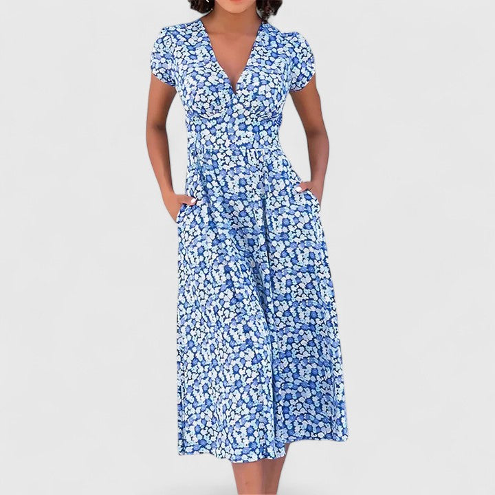 Women's comfortable flowy midi dress in a vibrant color, perfect for effortless casual or elegant summer style.