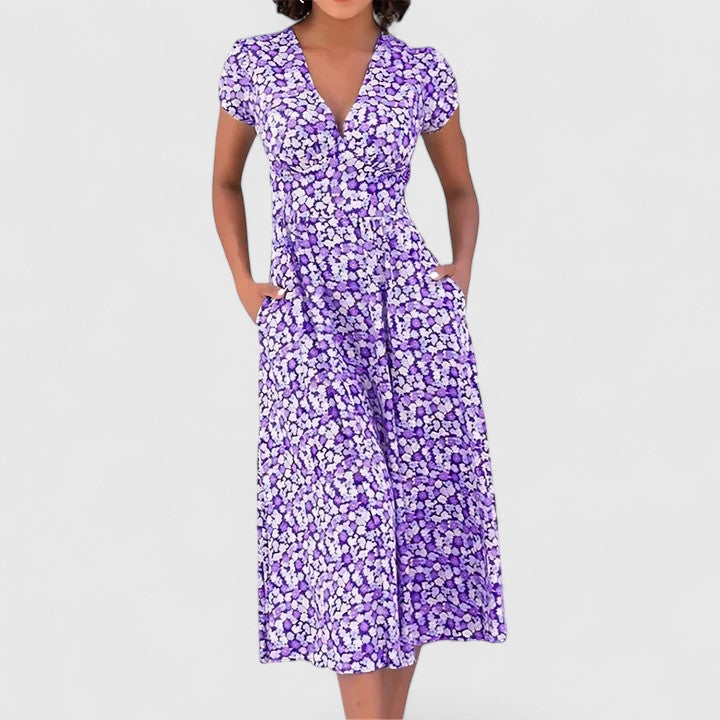 Elegant women's midi dress with a flowy silhouette, offering ultimate comfort for a stylish summer or party look.