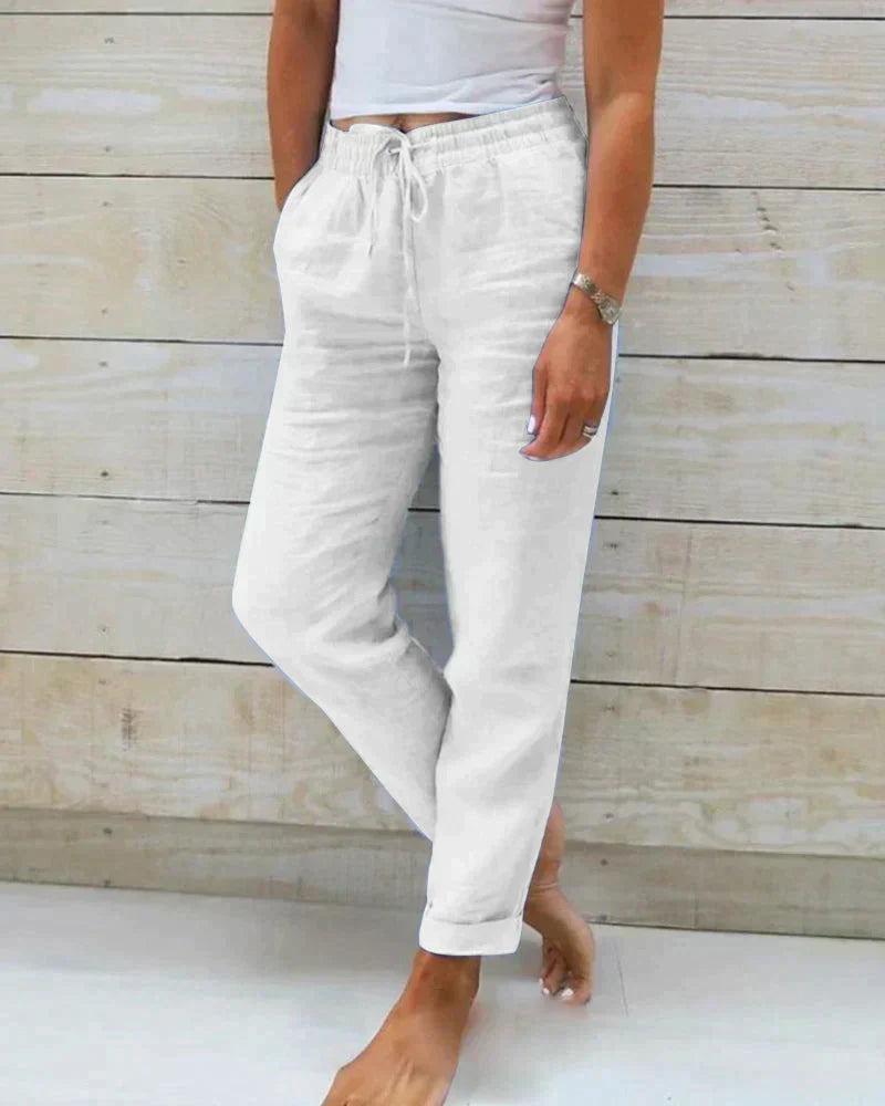 Stylish women's flowy wide-leg summer pants in a relaxed fit, ideal for casual and versatile warm-weather outfits.