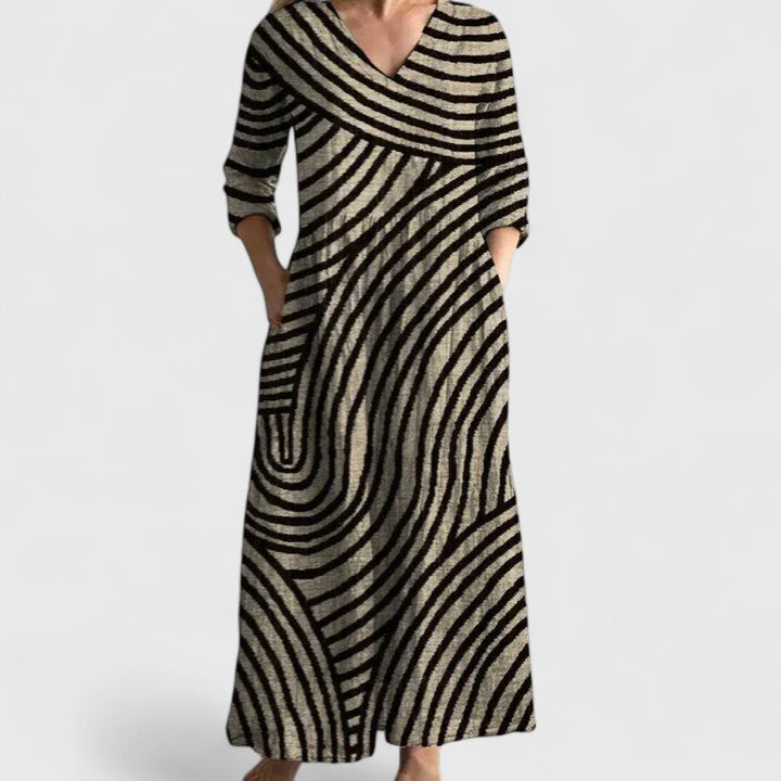 Women's comfortable geometric print midi dress with V-neck & pockets, perfect for stylish everyday wear.