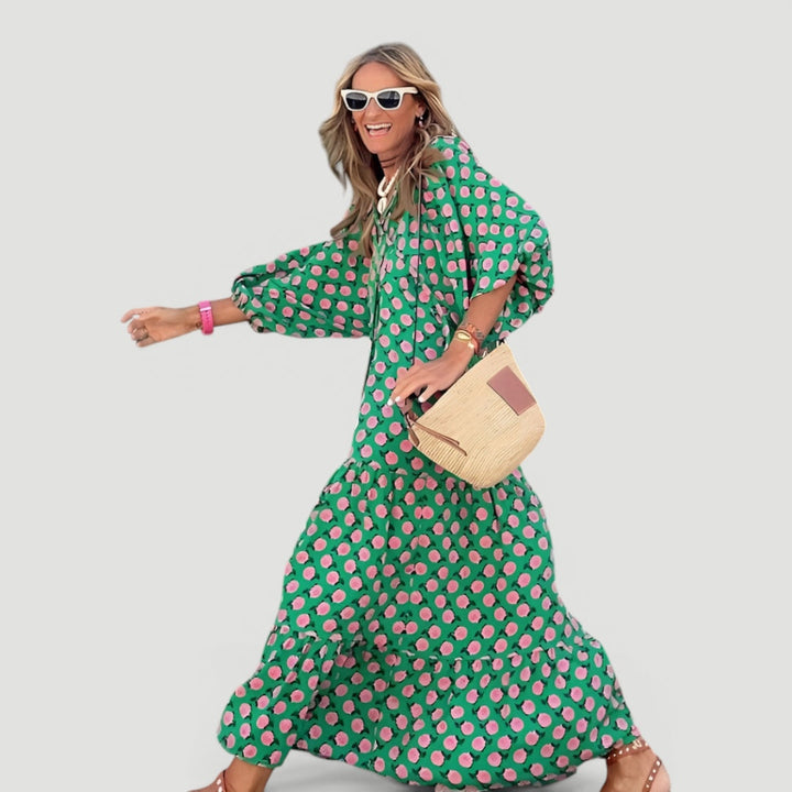 Women's comfortable green tiered maxi dress. Elegant design with balloon sleeves, perfect long summer vacation dress.