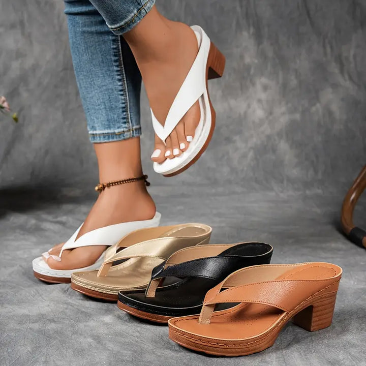 Comfortable women's heeled sandals for all-day wear. Elegant block heel dress footwear, perfect for summer.
