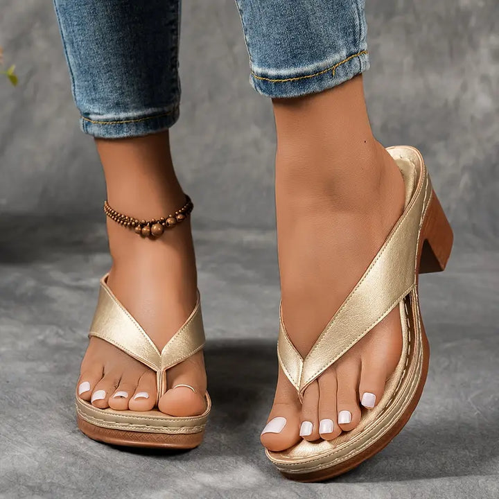 Elegant women's heeled dress sandals with a comfortable block heel. Versatile footwear for summer.