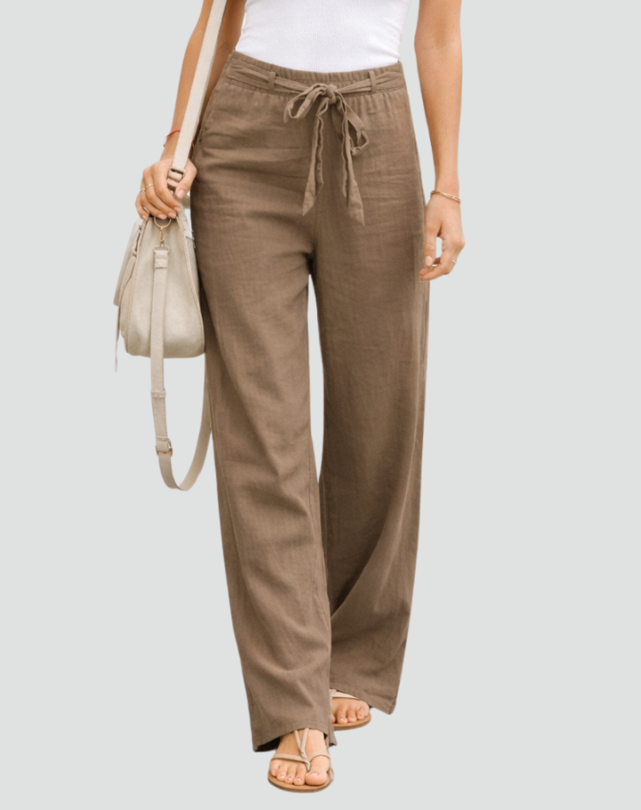 Women's comfortable linen wide leg trousers for a relaxed summer style, perfect for casual wear.