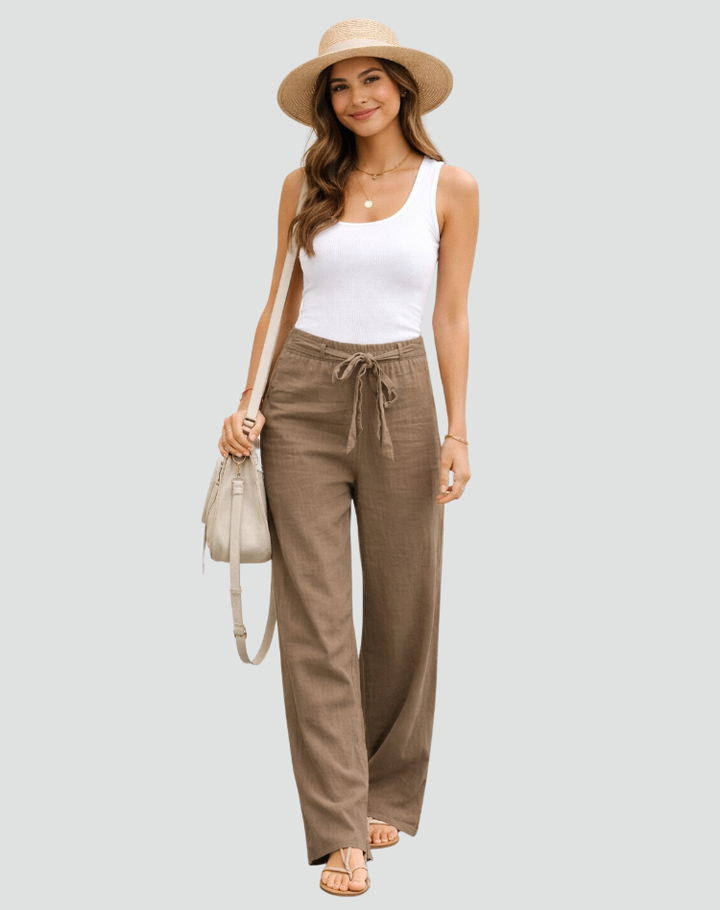 Blue comfortable women's wide leg linen pants, perfect for relaxing summer days or beach outfits.