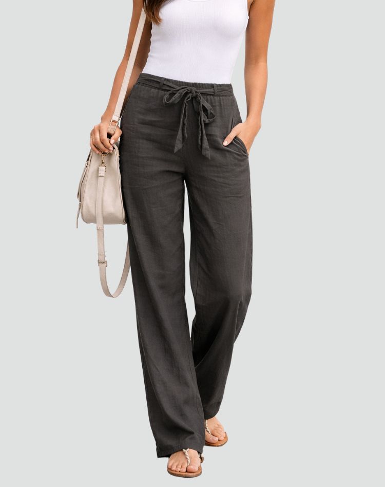 Green women's loose fit linen wide leg trousers, comfortable and stylish for summer casual wear.