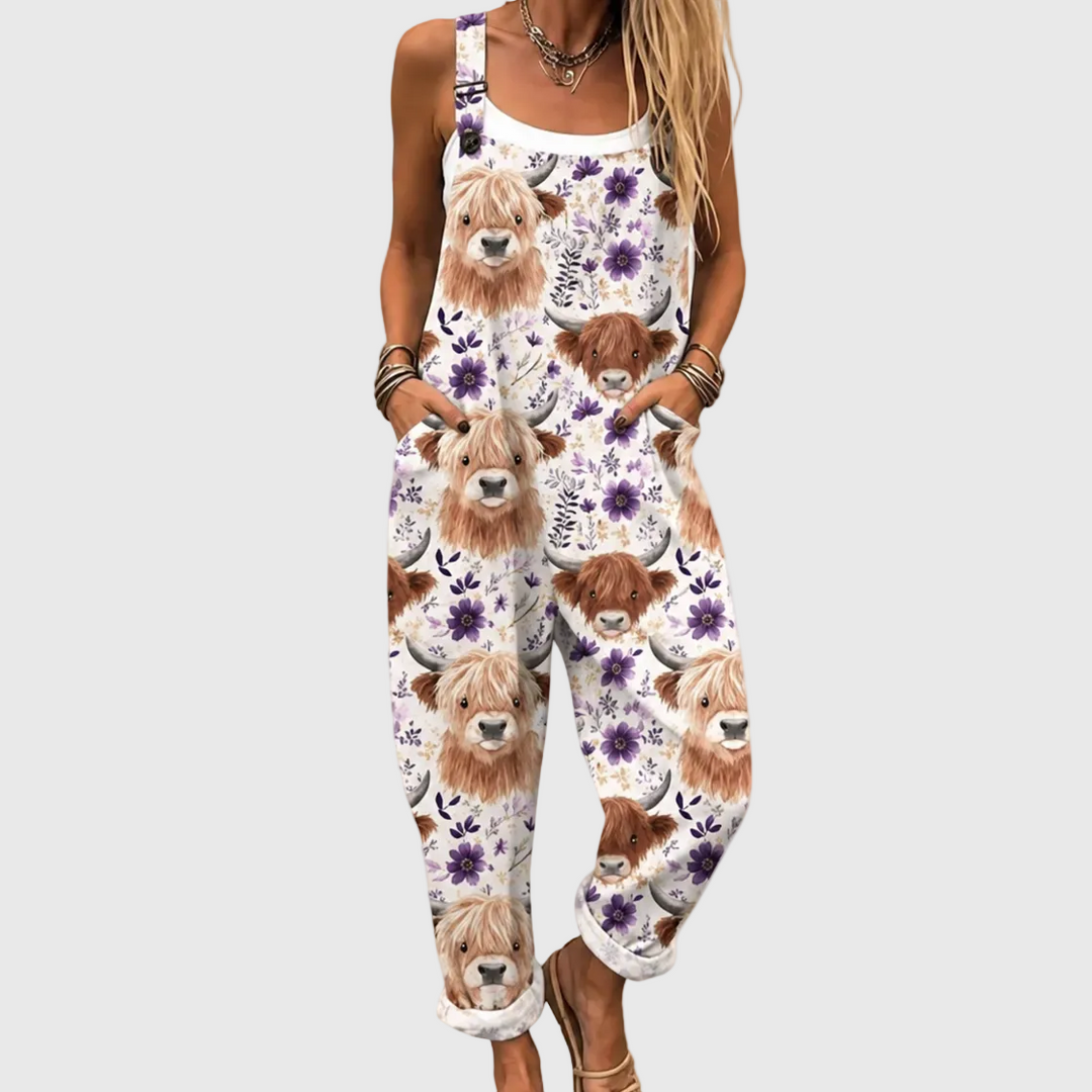 Women's comfortable loose fit overalls with unique highland cow & floral print, perfect for casual summer fashion.