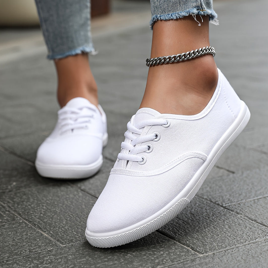 Women's comfortable low-top canvas lace-up shoes, perfect for versatile everyday casual wear.