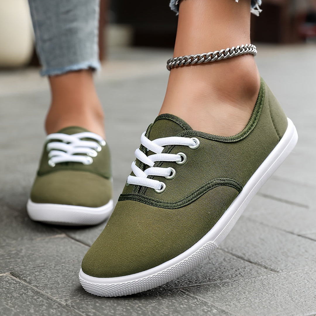 Versatile women's low-top canvas shoes, easy to wear with a comfortable lace-up design for any outfit.