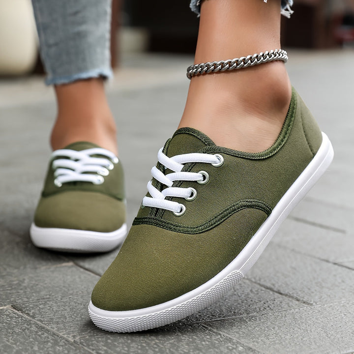 Versatile women's low-top canvas shoes, easy to wear with a comfortable lace-up design for any outfit.