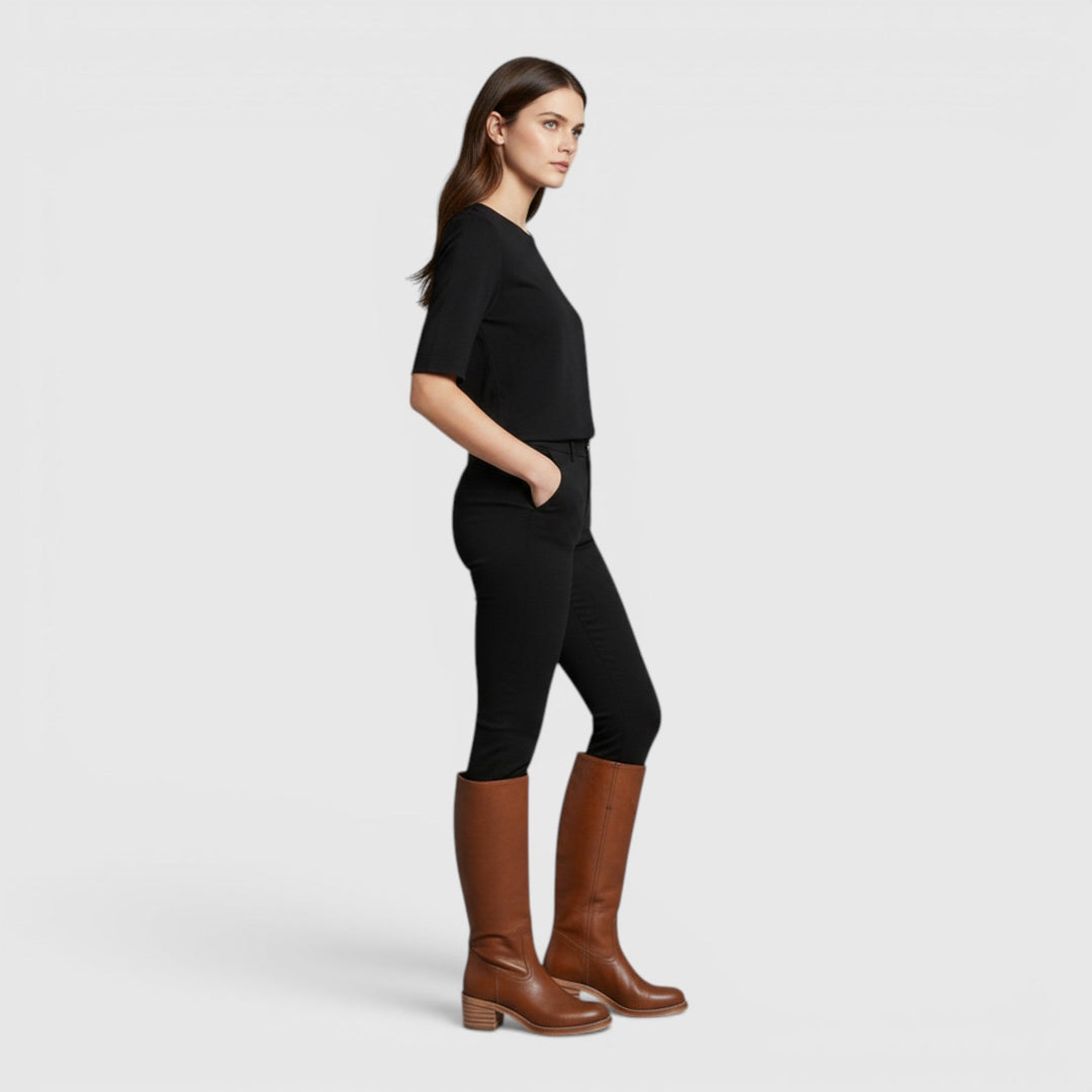 Durable faux leather women's mid-calf orthopaedic fall boots, offering comfort & support for daily wear.