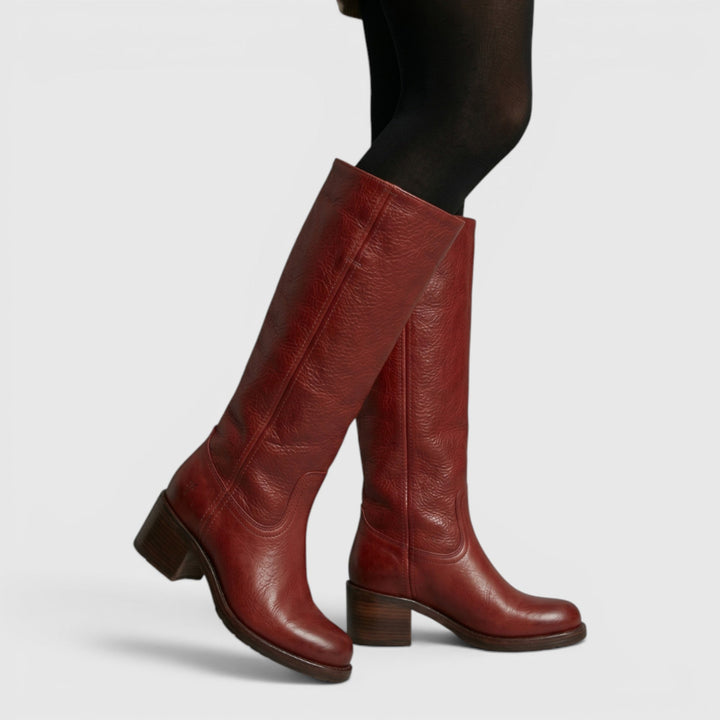 Pair of comfortable women's mid-calf orthopaedic fall boots, stylish and essential for autumn fashion.