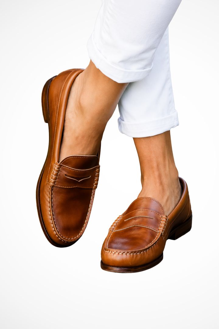 Women's comfortable orthopedic slip-on penny loafers in classic brown, ideal for everyday casual style and support.