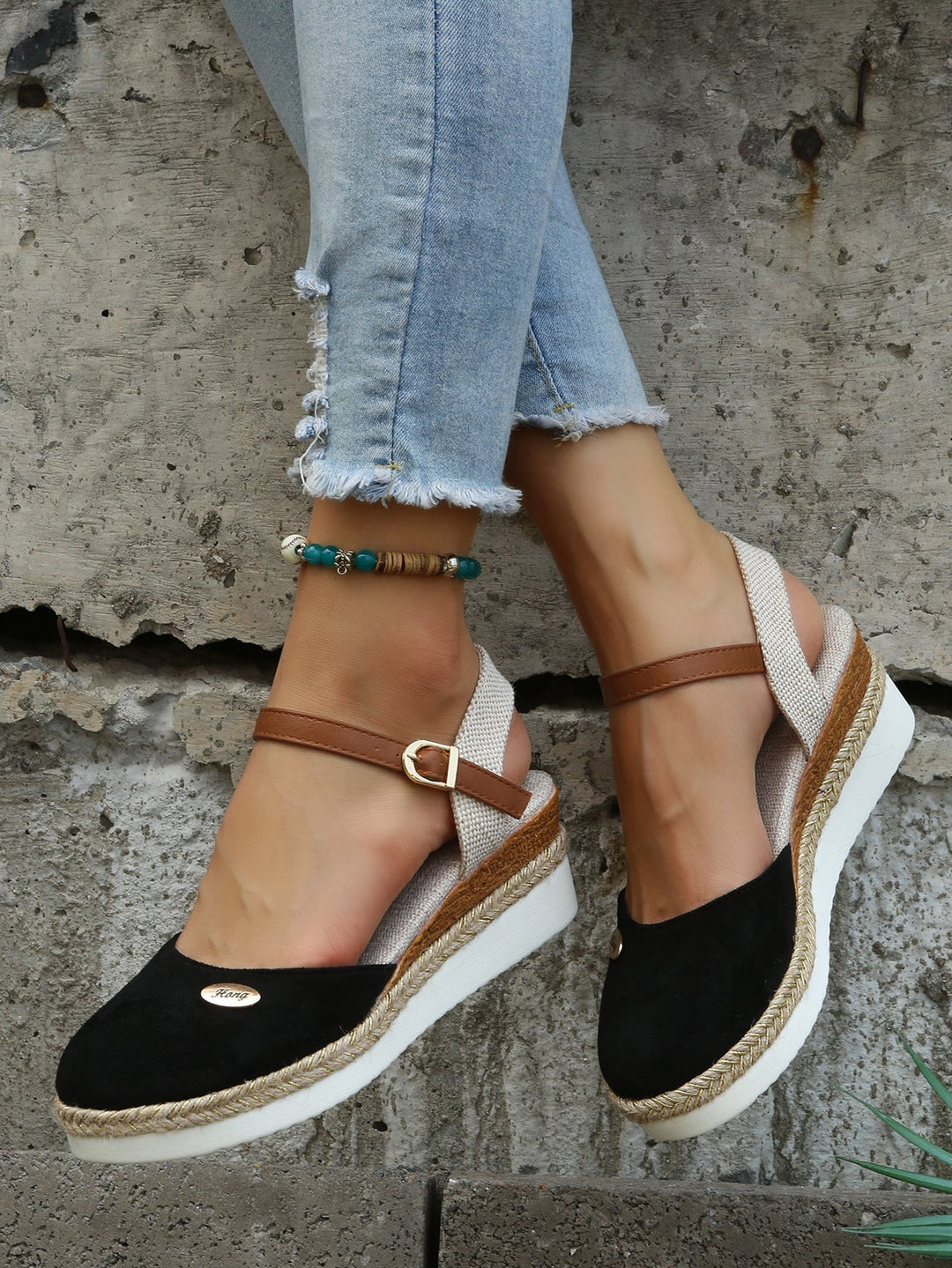 Cushioned women's orthopedic sandals with breathable woven straps, designed for superior comfort and support.