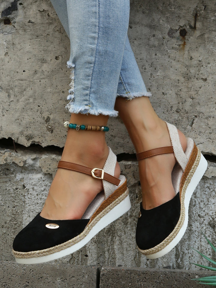 Cushioned women's orthopedic sandals with breathable woven straps, designed for superior comfort and support.