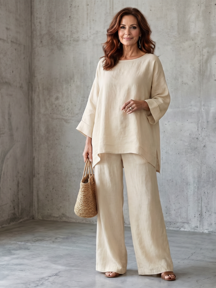 Soft women's loungewear set: relaxed oversized tunic and comfortable wide-leg pants for home.