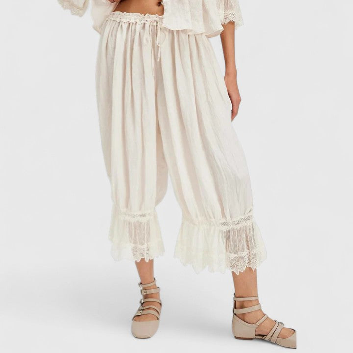 Women's comfortable mid-rise patchwork lace trousers, perfect for a relaxed yet stylish casual look.
