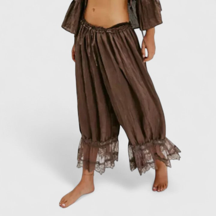 Stylish women's mid-rise lace pants with unique patchwork design, comfortable and fashionable.
