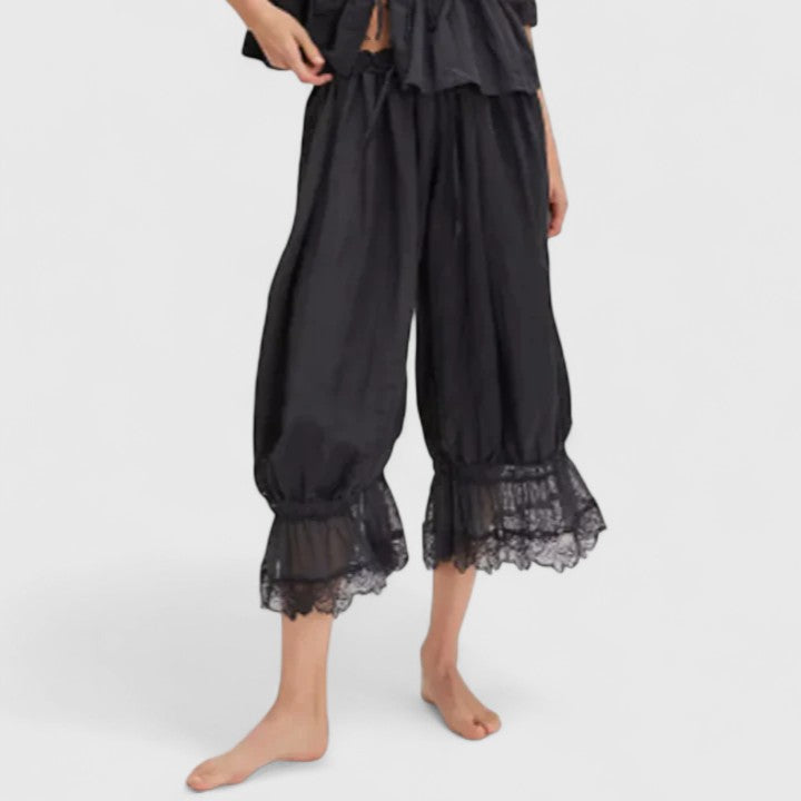 Versatile women's comfortable trousers, combining a loose fit with stylish patchwork and lace details.