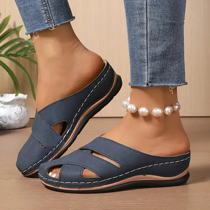 Women's comfortable peep-toe wedge platform sandals, perfect for stylish summer wear.