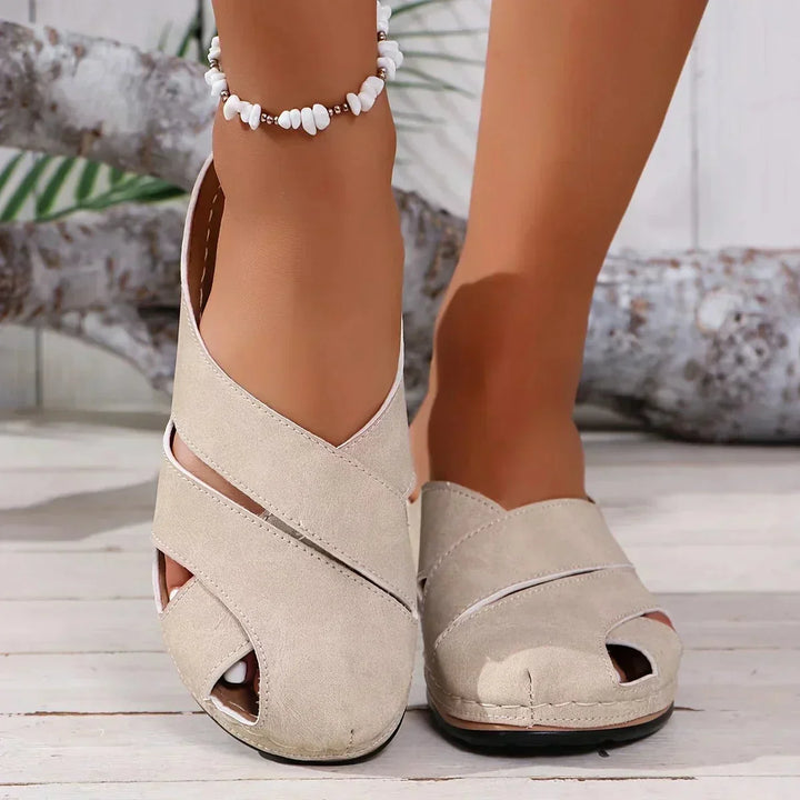Blue women's slip-on peep-toe wedge platform sandals, offering style & comfort for summer footwear.