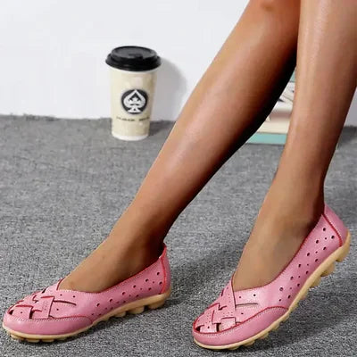 Stylish women's perforated slip-on loafers with round toe. Comfortable casual flats for everyday and autumn wear.