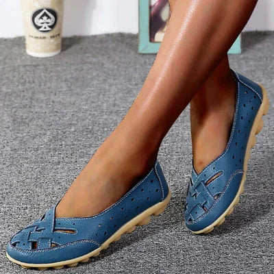 Women's perforated slip-on loafers with gripped sole & round toe. Comfortable casual flat walking shoes.
