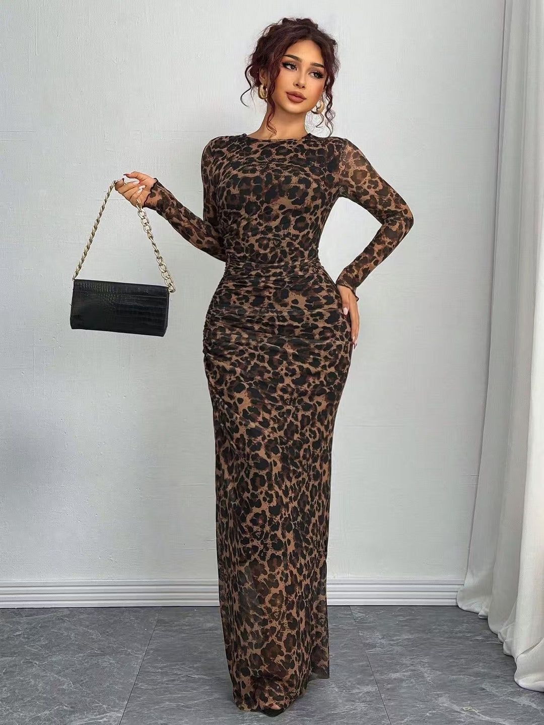 Comfortable bodycon maxi dress for women. Features long sleeves, round neck & eye-catching print.