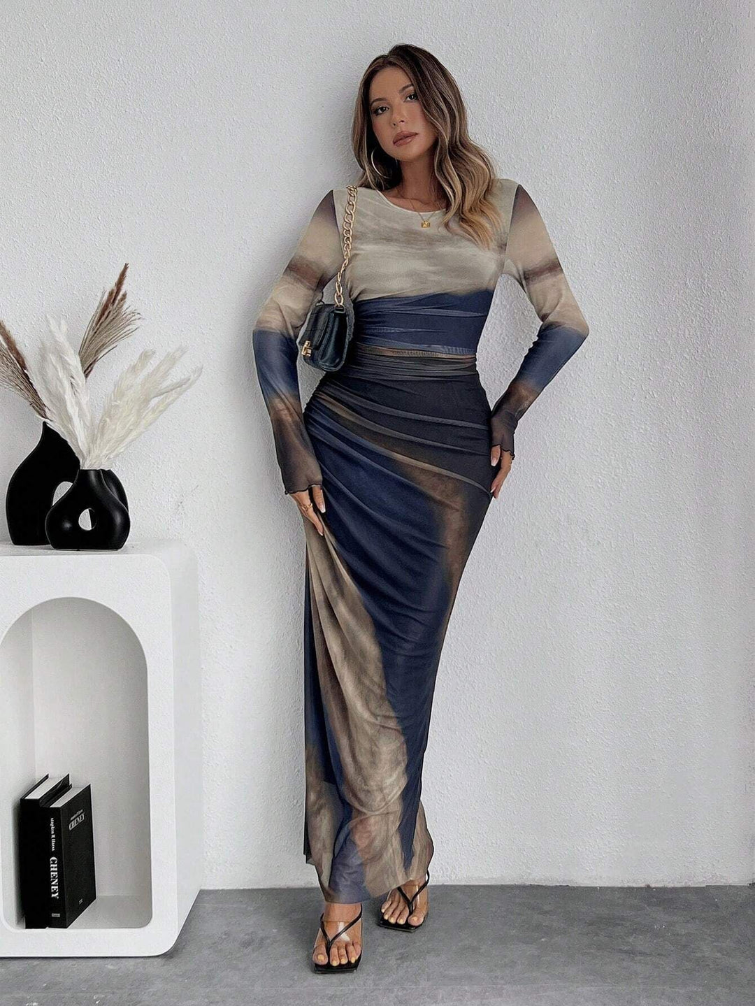 Versatile printed long sleeve bodycon maxi dress. Effortless day-to-night women's fashion.