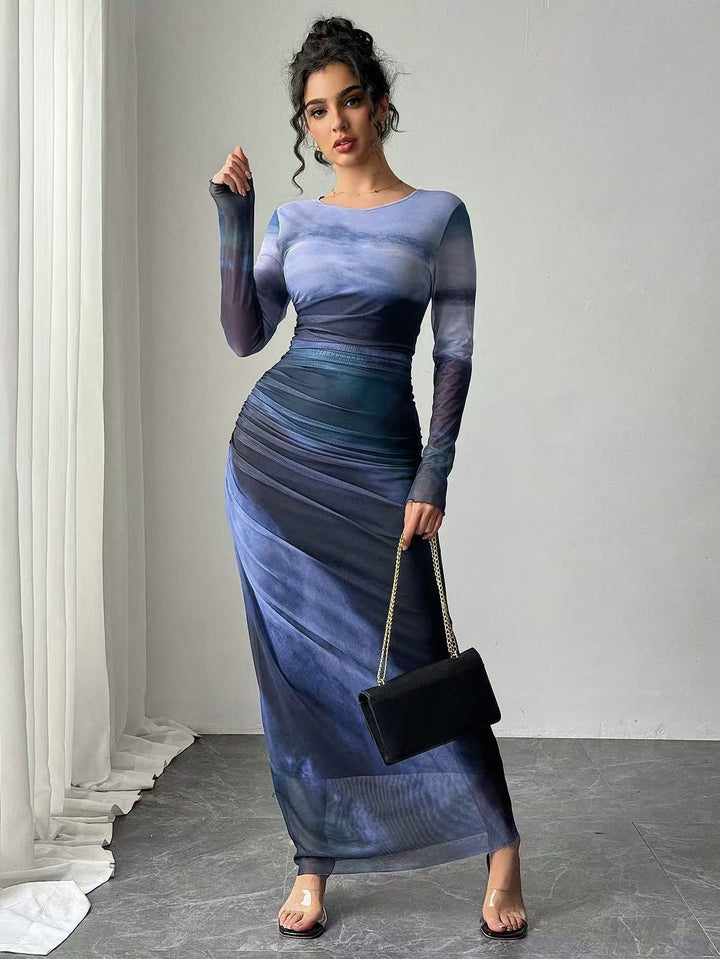 Women's printed bodycon long sleeve maxi dress. Comfortable and stylish for any occasion.