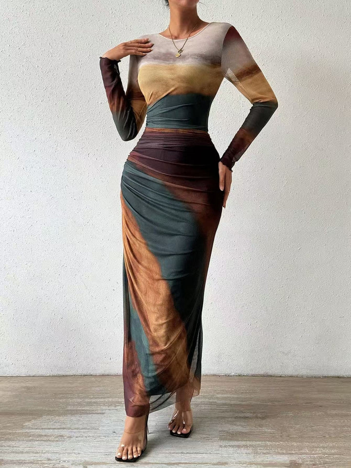 Statement print bodycon long sleeve maxi dress. Elegant and comfortable women's fashion.