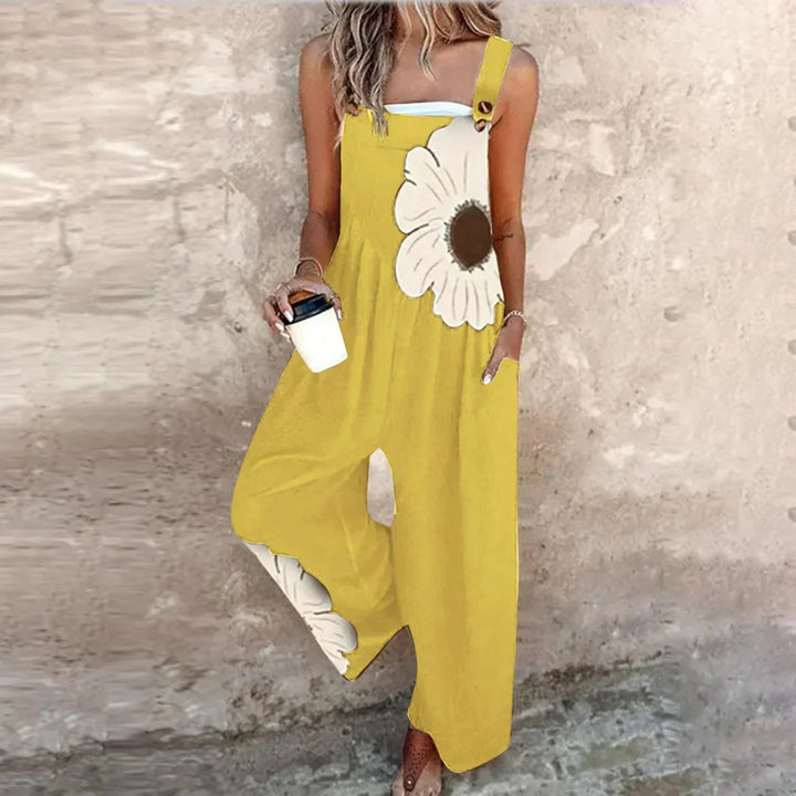 Woman confidently wearing a comfortable printed jumpsuit, highlighting its ease and modern summer style.