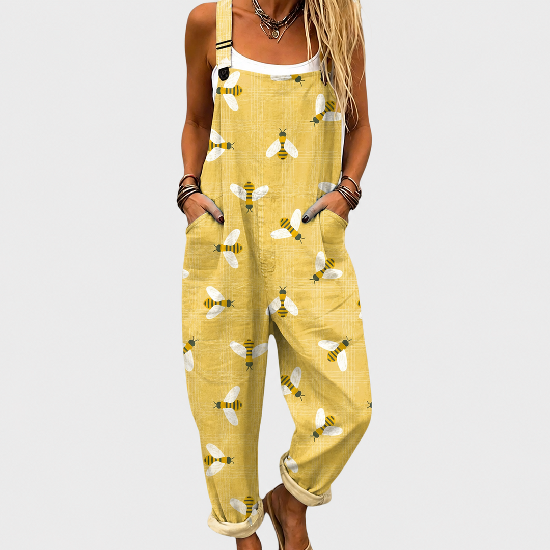 Women's comfortable printed overalls, relaxed wide-leg fit, adjustable straps, perfect for casual summer fashion.